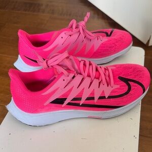 Nike Women's Bright Pink Athletic Running Shoes with Black Swoosh